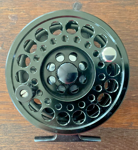 Deluxe black fly - fly, reel